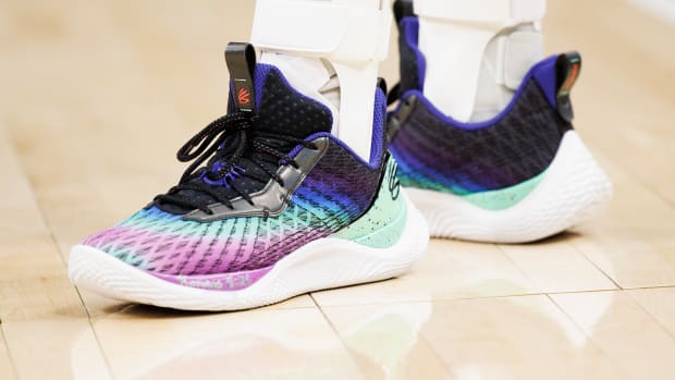 View of Stephen Curry's black and purple shoes.
